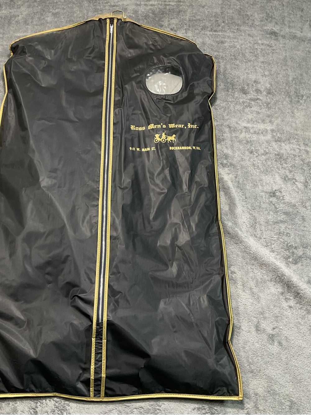 Vintage men’s three-piece suit with garment bag made in USA